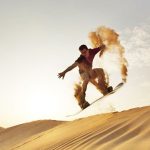 تفریحات کویری | از سافاری و موتورسواری تا کمپینگ و شترسواری 34 اسکی روی شنهای کویری یکی ورزش جذاب است که در ایران کمتر به آن پرداخته شده.