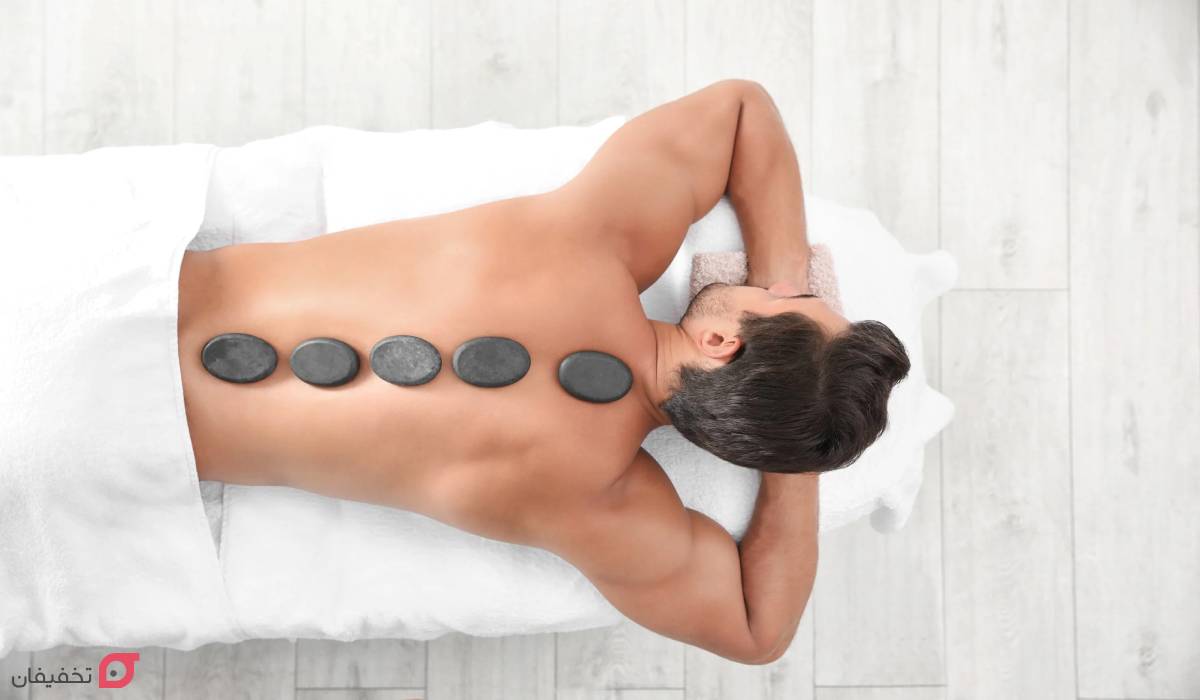 ماساژ سنگ داغ چیست و چگونه است | تاریخچه و فواید | آموزش 7 ماساژ سنگ داغ