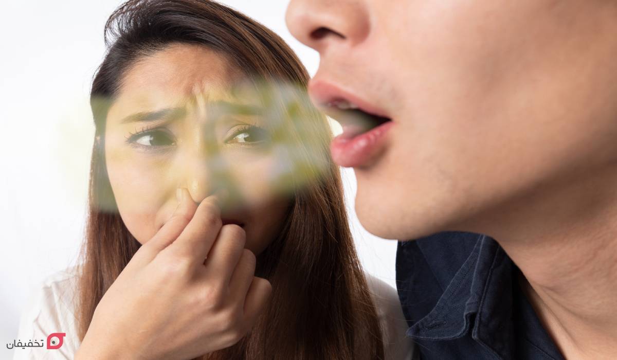 بوی بد دهان نشانه چیست؟