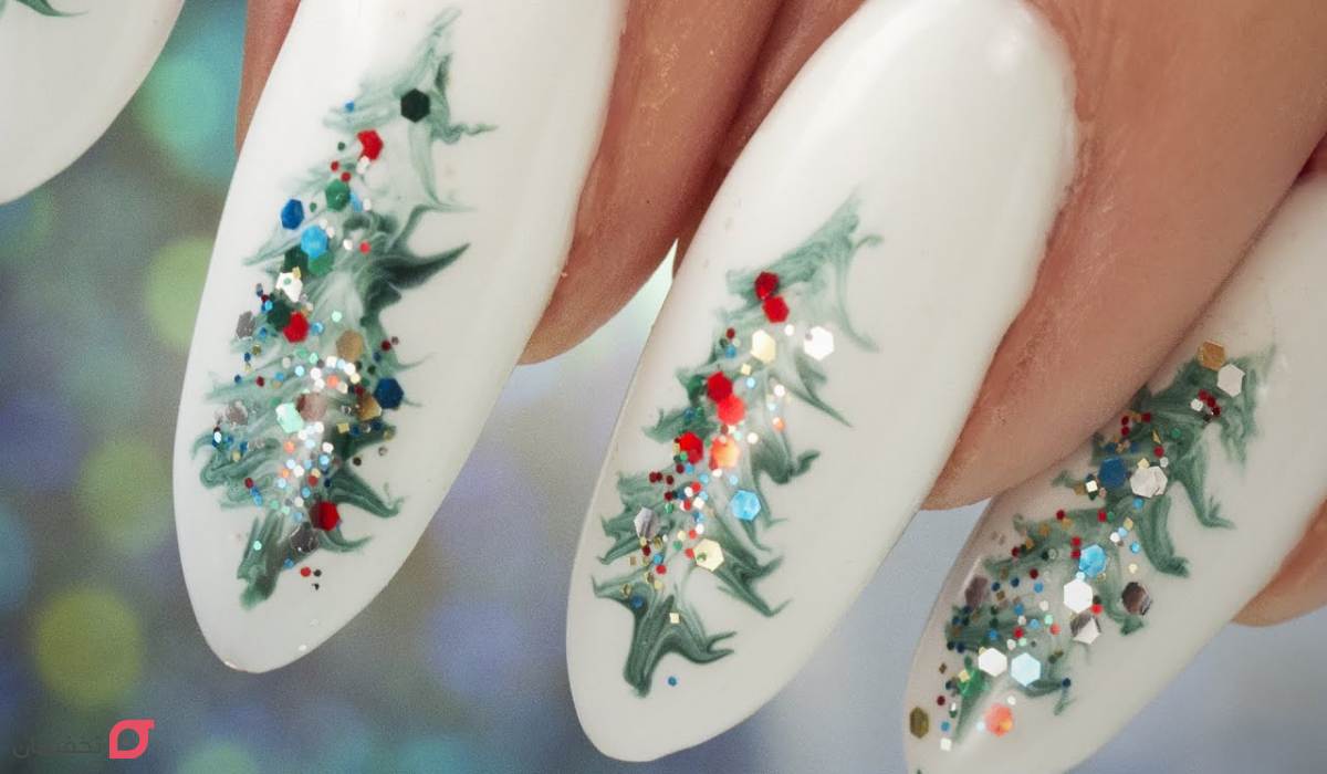 طرح ناخن کریسمس | عکس 22 مدل شیک و ساده جدید 2026 15 طرح ناخن درخت کریسمس
